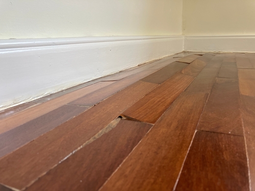 damaged-flooring-due-to-weather