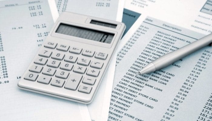 expense list and a calculator