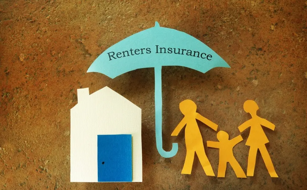 umbrella with "renters' insurance" on it, next to a house and a family