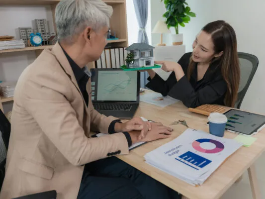 Landlord discussing questions about tenant abandonment with a property professional