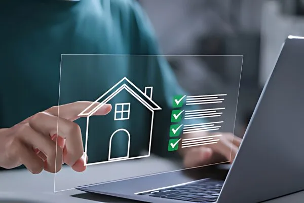 Person reviewing real estate checklist with home status updates on a digital screen