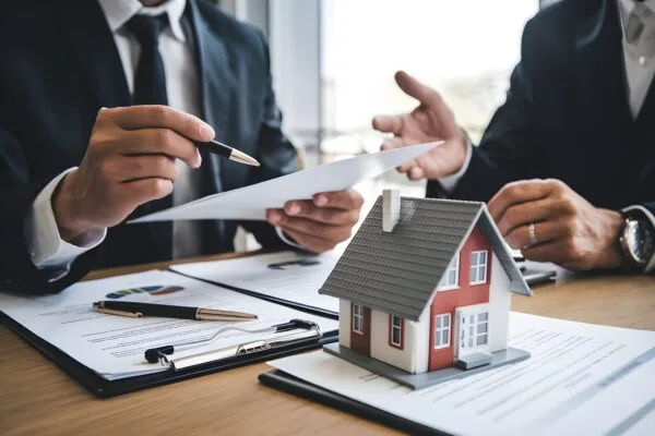 Meeting between tenant and property manager about running a business from home