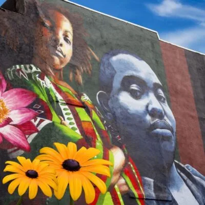 Colorful mural on rowhome in Baltimore