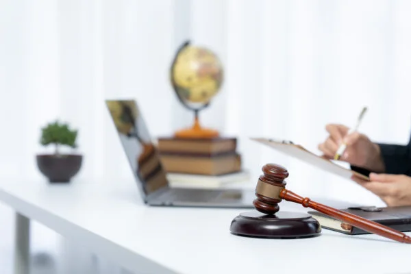 Judge reviewing documents during hardship stay of eviction request