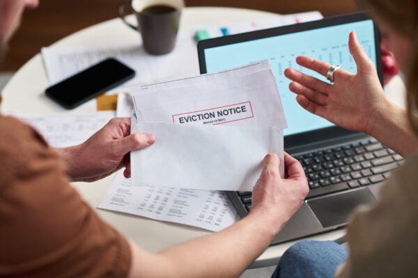 Tenant reviewing an eviction notice after court approval