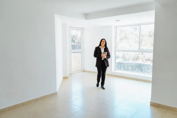 Property manager inspecting a clean and well-maintained rental unit
