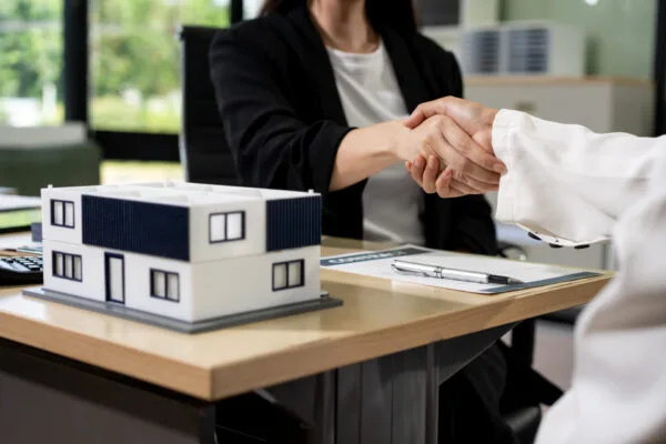 Landlord and tenant reaching an agreement to avoid eviction