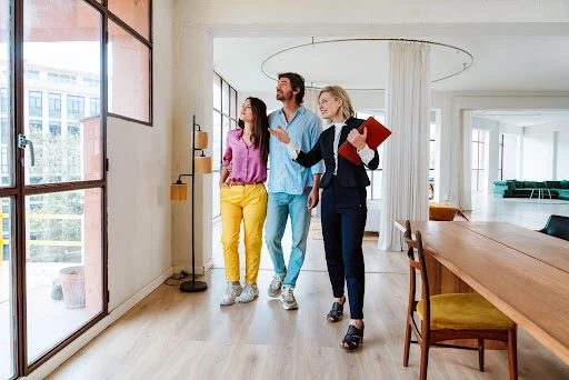 Prospective tenants touring a rental property before submitting a rental application.