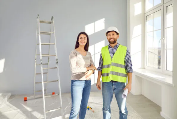 Rental property owner and contractor planning renovations before renting out a home